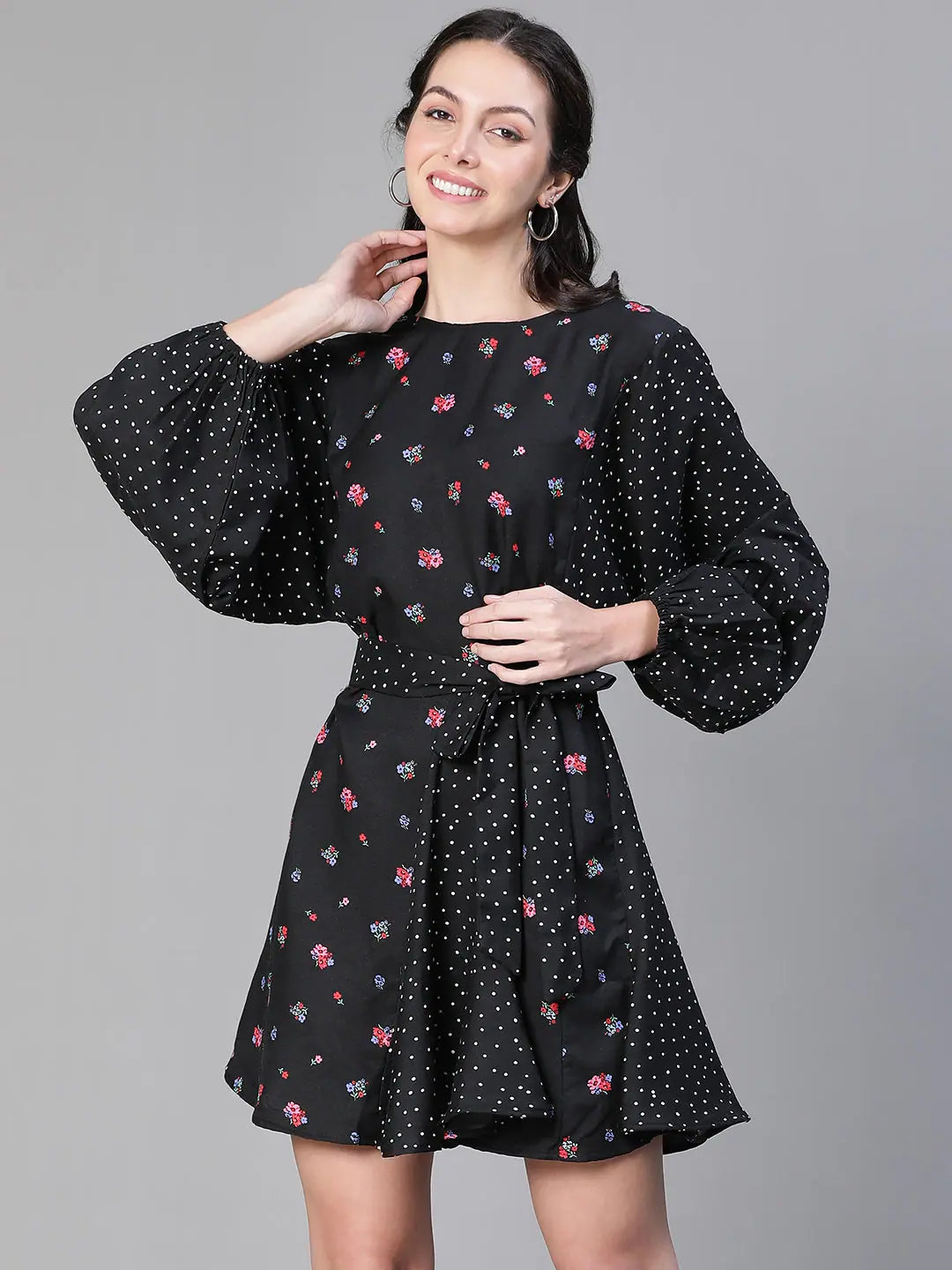 Women floral print black round neck belted flared dress